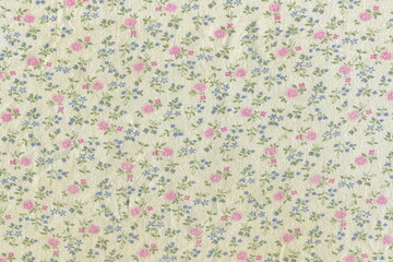 Texture of cotton fabric in a small flower. Abstract background of simple rural fabric. Rough...
