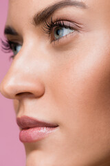 Naklejka premium closeup of beautiful woman with perfect skin isolated on pink