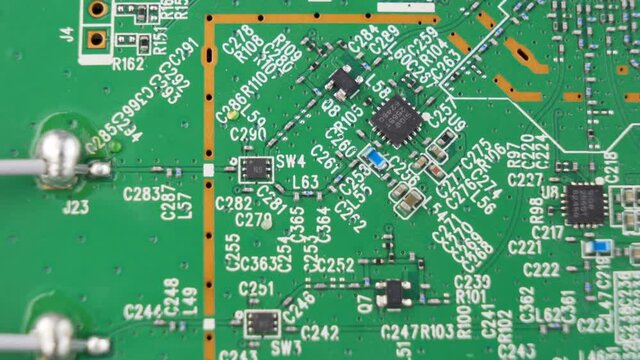 Macro shot of Circuit board with resistors microchips and electronic components