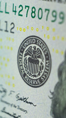 Stamp on a dollar banknote with an eagle and the words United states federal reserve system