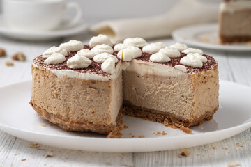 Delicious cheesecake with cream cheese and cocoa.