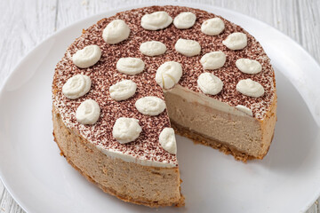 Delicious cheesecake with cream cheese and cocoa.