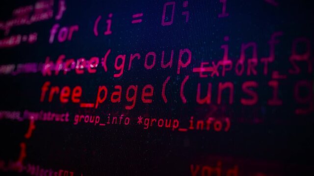 Close-up of Red Program Code on a Computer Screen in Defocus. Software development and hacking concept. Technology, coding, programming
