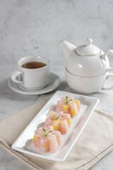 Cantik Manis. Indonesian traditional steamed dessert made from mung bean flour, sago pearls and coconut milk.