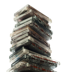 Collection of music cassettes stack isolated on white background.