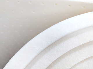 Production of mattresses for beds. Clothing industry. Filler for mattress. Texture of latex material
