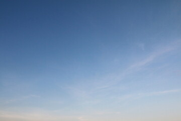 Fototapeta premium Blue sky background with white clouds. 