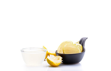 Freshly squeezed lemon juice in a small bowl Put on white