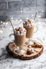 Still life cup of hot chocolate with marshmallows. Christmas. New Year. A festive hot drink. Mug of cappuccino. Sweet dessert.