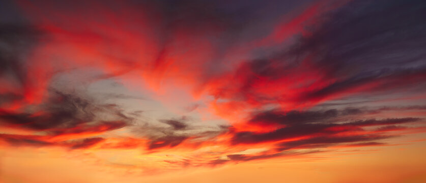 background of cloudscape with red clouds at sunset on sky