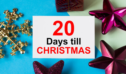 Christmas toys with greeting card with text 20 Days till Christmas