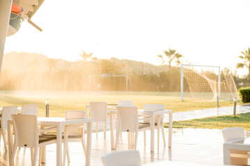 table and chairs on the beach
