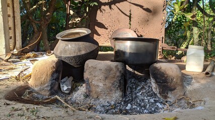 Unique food cooking on natural stove of indian rural village
