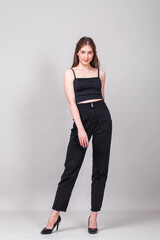 Full body portrait of a young beautiful brunette girl