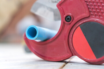 Plumber Repairing cuting pvc pipe for fix broken Water faucet for maintenance