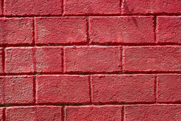 Red bricks decorative texture, closeup photo. Rustic brick masonry. Orange brick paving. Modern countryside building. Simple house wall texture. Brickwork surface
