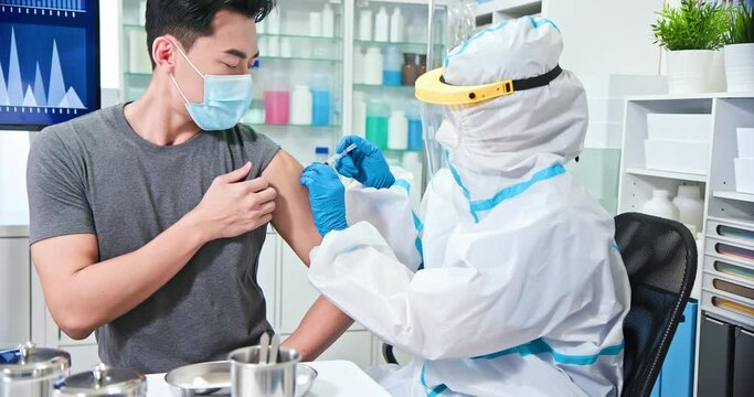 nurse making a vaccination