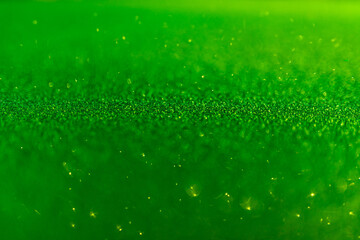 drops of dew on a green background