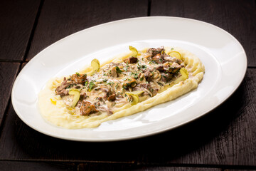 beef stroganoff with beef tenderloin and mashed potatoes