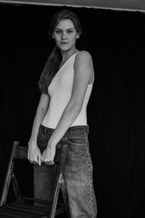 portrait of ginger woman in jeans