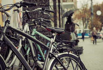 Fototapeta na wymiar parked bikes on city street