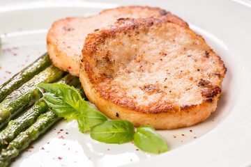 crab cutlets with asparagus and basil
