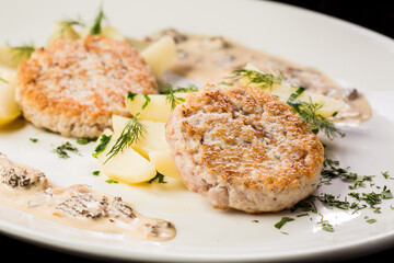 chicken cutlet with potato wedges ready-made dish for the menu