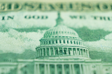 Imprint of the U.S. Capitol building on a dollar bill banknote
