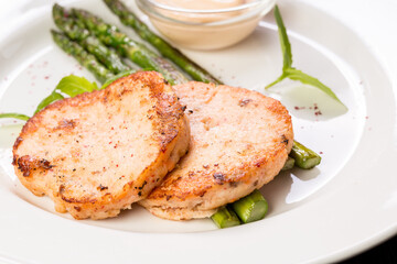 crab cutlets with asparagus and basil