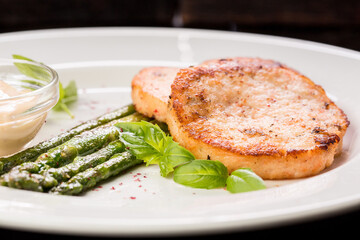 crab cutlets with asparagus and basil