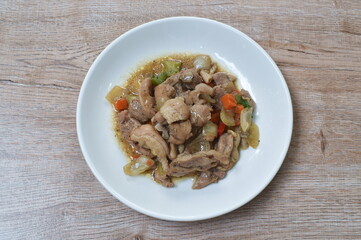 fried chicken with slice sweet bell chili black pepper sauce on palte