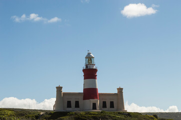 Fototapeta na wymiar Watching over you, lighthouse in Cape Agulhas, Western Cape, South Africa