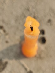 Fototapeta na wymiar candles on the beach