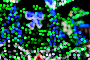 Festive multicolored blurred abstract background. Christmas lights bokeh background