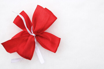 Red bow on white background