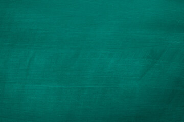 Abstract texture of chalk rubbed out on green blackboard or chalkboard background. School education, dark wall backdrop or learning concept.
