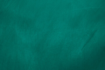 Abstract texture of chalk rubbed out on green blackboard or chalkboard background. School education, dark wall backdrop or learning concept.