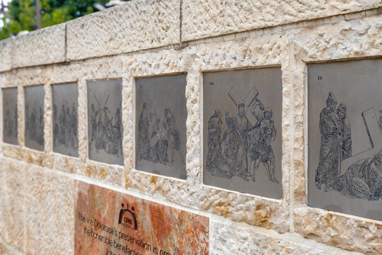 Jerusalem, Israel, November 14, 2020 : Images of the stations of the Cross Procession on the wall in Lions Gate Street near the Lions Gate in the old city of Jerusalem, in Israel
