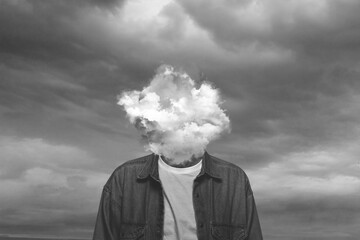 Black and white. Male body of model with head full of smoke about sky and clouds. Trendy colours, gradient grey-white background. Contemporary art collage. Inspiration, mood, creativity, brain concept
