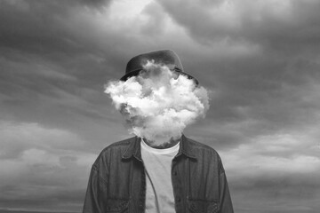 Black and white. Male body of model with head full of smoke about sky and clouds. Trendy colours, gradient grey-white background. Contemporary art collage. Inspiration, mood, creativity, brain concept