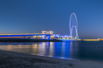 Fototapeta na wymiar Bluewaters Island Dubai and Ferris wheel in night illumination