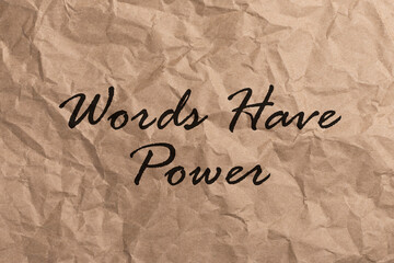 Text WORDS HAVE POWER on craft crumpled paper