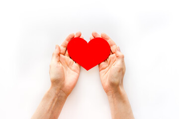 Obraz premium Love concept. Heart made of red paper, top view