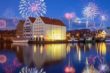Fototapeta na wymiar New year celebrate fireworks over Old Town of Gdansk. Poland, Europe