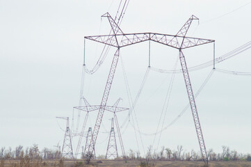 large power line towers against the sky