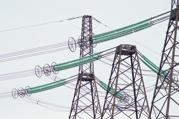 large power line towers against the sky