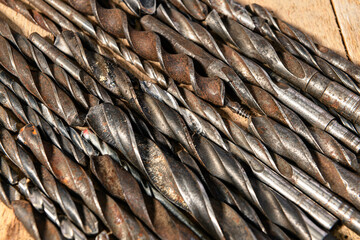old vintage hand tools - set of drills on a wooden background