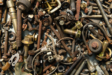 background from old vintage hand tools - set of different screws and nuts