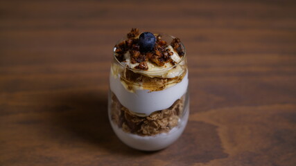 cream in a glass with nuts