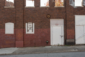 Red brick abandoned building with no roof in downtown Atlanta Georgia